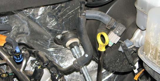 Use an 8mm socket to remove the two remaining throttle body bolts. 21.