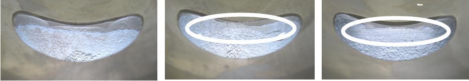 The top edge of the exhaust port may show either just a cast finish surface (left picture) or signs of a CNC machining (central picture) or
