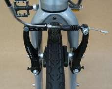 To reconnect after wheel is on, hold the brake arms together and place the silver insert into the cable stop as shown (3-B) or as seen on the rear brake
