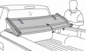 Push down on the saddle to release it from the inner lip of the truck bed.
