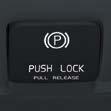 Manual release Press firmly on the brake pedal. Pull the PUSH LOCK/PULL RELEASE control. Automatic release Begin driving.