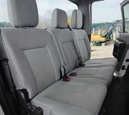 fold-down armrest with tray and cupholders 2 High-back bucket with integrated head restraint, fore/aft adjustment, reclining, manual lumbar and armrest Driver Air suspension with integral pump