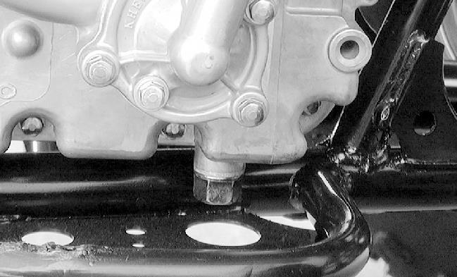 2-2. Engine oil replacement A. Place the machine on a level place. B. Warm up the engine for several minutes and stop it. C. Place a container under the engine. D.