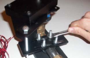 Install pipe mount bracket and motor mount bracket in desired positions so that the threaded rod