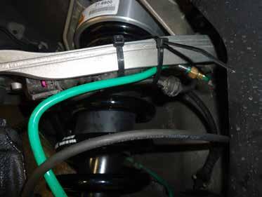 SECURE THE AIR LINE AND SHOCK SENSOR WIRE IN A SUITABLE LOCATION.