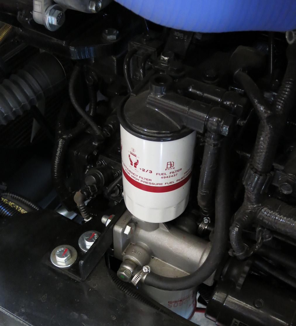 The presence of coolant in the recovery bottle does not mean radiator is full. Hot coolant and steam from the radiator can cause severe burns. Never open the radiator cap of a hot engine.