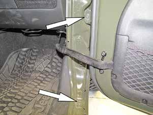 studs. 12. Loosen the two fender bolts inside the passenger door jamb. 2.