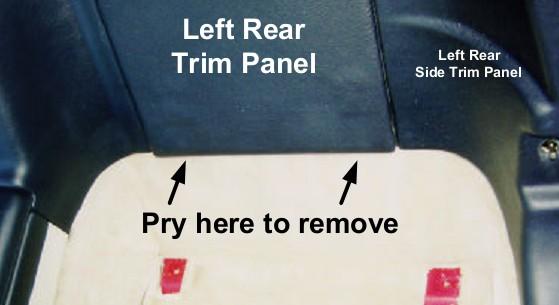 Remove the rear lower panels behind the seats by lifting in an upward direction with your hands.