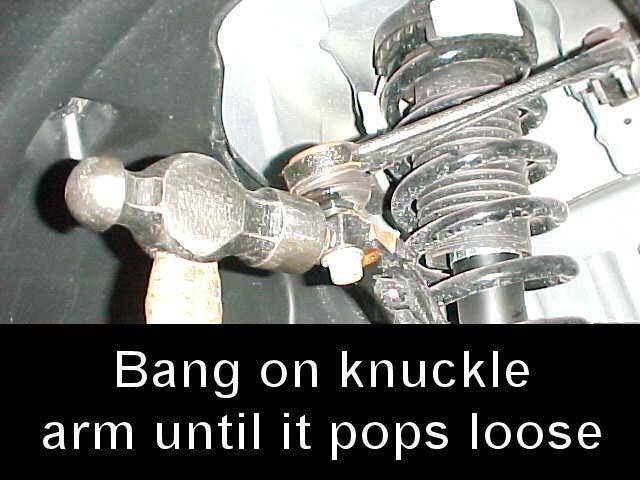Use a hammer to smack the control arm flat spot in order to break loose the ball joint stud.