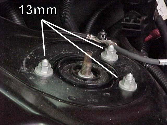 6) Open the hood of the vehicle and pop off