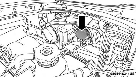 2. Reach behind the headlamp housing to access the headlamp (outboard) bulb cap. IN CASE OF EMERGENCY 311 4.