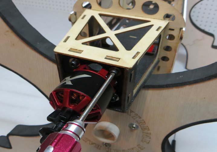 Install the motor on the front of the motor box using the provided 4mm socket head