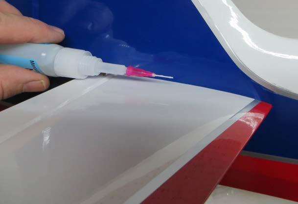 19. Insert the stabilizer into its slot and the carbon fiber wing tube into the its sleeve.