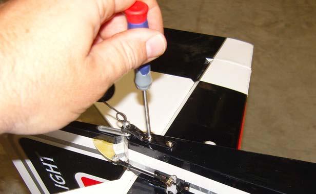 Remove all of the set screws, apply blue Loctite, re-install and tighten. Secure the tailwheel bracket to the bottom rear of the fuselage with the provided wood screws.