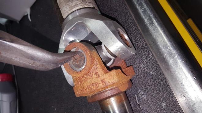 14. Remove the original yoke from the drive shaft and