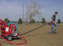 4) After steps 2 and 3 have been performed, the sprinkler cart can be pulled out.