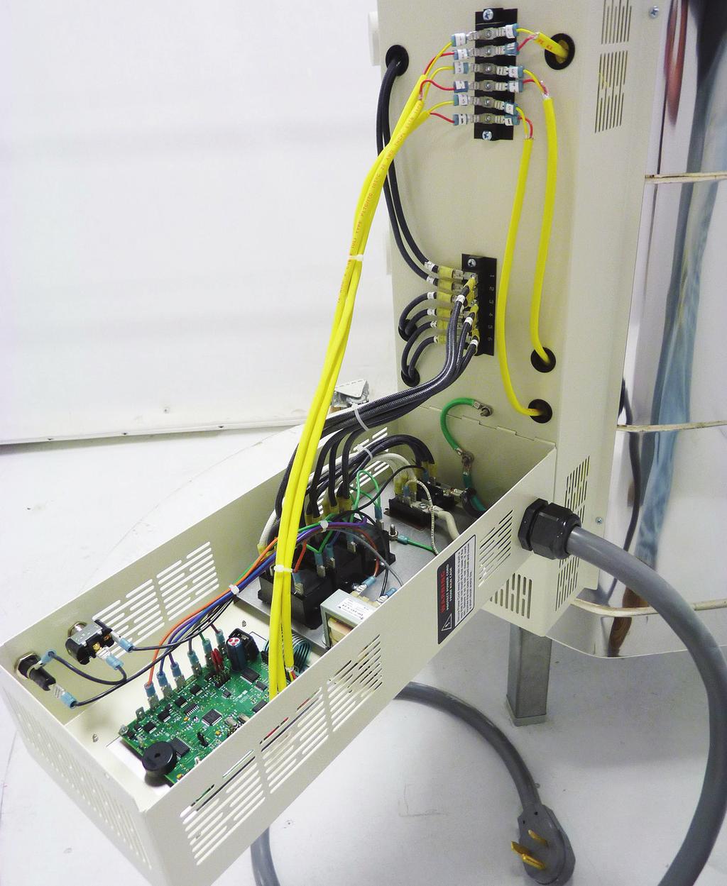 Photo of a 1-phase control panel for a three section Easy-Fire kiln L-G-TRTC/EF Thermocouple Terminal Strip S-E-ECBX/03 Element Cover Box L-G-HETP/PR Power Element Lead Wires (Top Zone) L-G-BUSH/EF