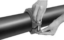 INSTALL COUPLING HALVES: For a swing-over installation, place one of the coupling halves around the bottom side of the gasket and swing over the other coupling