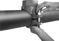 POSITION UPPER HOUSING: Place the upper housing on the pipe so that the locating collar engages properly into the