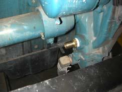 5) to the bottom spigot of the oil cooler. Water pump straight fitting Figure 3.5 Cooler mounting locations 5.