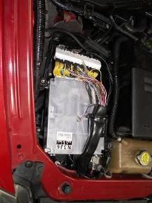 Remove these 3 screws and the retaining clips to expose the factory ECU.