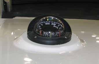 Propulsion System Compass All boats are equipped with a compass on the top of the instrument panel.