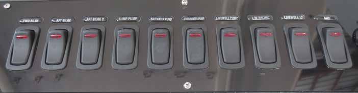 Electrical System Starboard Helm Accessory Switch Panel Nav LT A three-position switch that activates the navigation and anchor lights. The middle position is OFF.