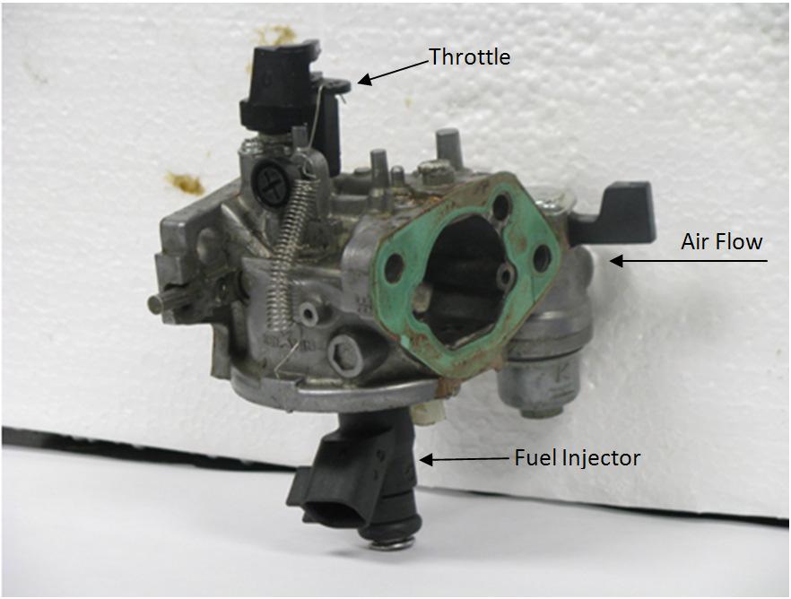 Figure 6: Throttle body with fuel injection system. are measured by the torque transducer mounted in line between the engine and the AC dynamometer.