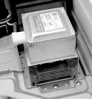 ELECTRICAL SHOCK HAZARD Disconnect power before servicing. Replace all panels before operating. Failure to do so could result in death or electrical shock. REMOVING THE MAGNETRON WARNING 5.
