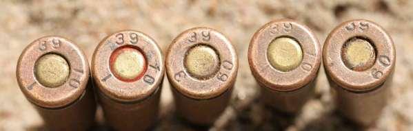 The ammunition headstamp features three entries: calibre ( 39 ), date ( 10 or 09 ), and what appears to be a lot or batch designator ( 1 or 3 ).