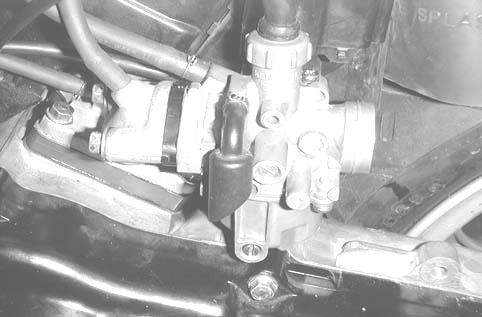 CARBURETOR INSTALLATION Check the carburetor insulator and O-ring for wear or damage. Install the carburetor and insulator onto the intake manifold and tighten the two lock nuts.