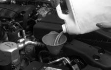 3. Fill with the proper DEX-COOL coolant mixture. 4. Continue to fill the radiator up to the base of the filler neck. 5.