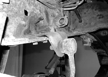 Disconnect the front driveshaft from the