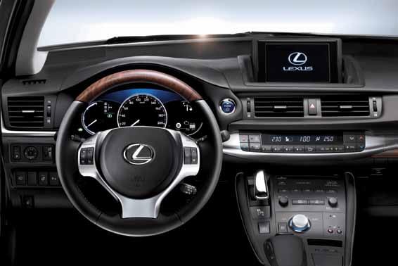 (Optional) The high-grip wood and leather sports steering wheel is ergonomically designed and very tactile.