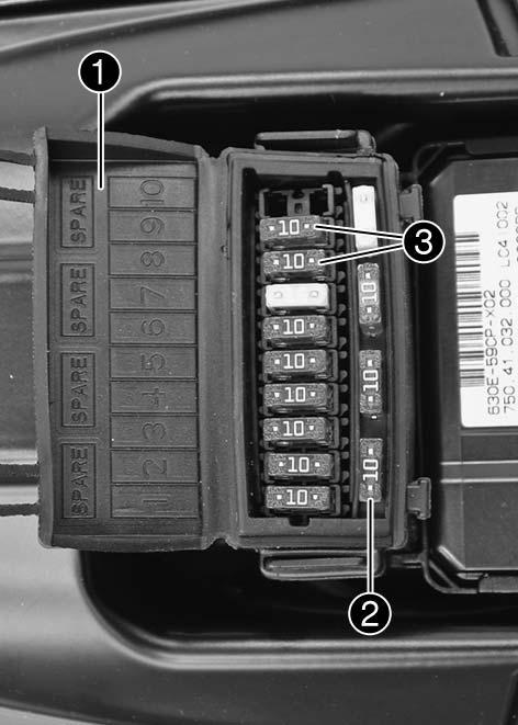 Spare fuses [2] with 10 and 15 amperes are also found in the fuse box. NO CONSUMER AMPERES 1......... Ignition, instrument cluster, alarm system (optional)...............10 2........ Clock, ignition (CDI).