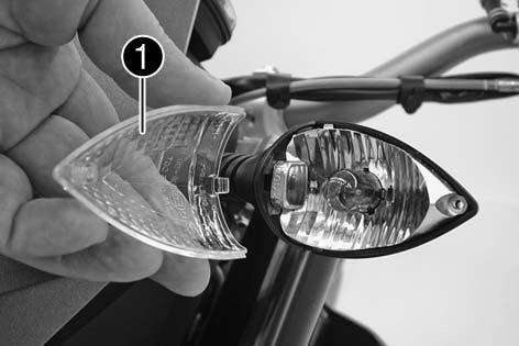 Turning in a clockwise direction will increase the headlight range, turning in a counterclockwise direction will reduce the headlight range.