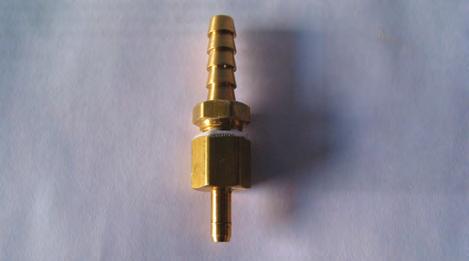 5 Locate the two supplied 1/4 barbed male brass fittings and the two supplied 1/8 female brass