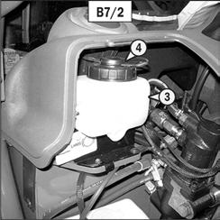 B8/1) and remove the access panel for brake fluid reservoir and windshield washer tank (2) (fig. B8/1).