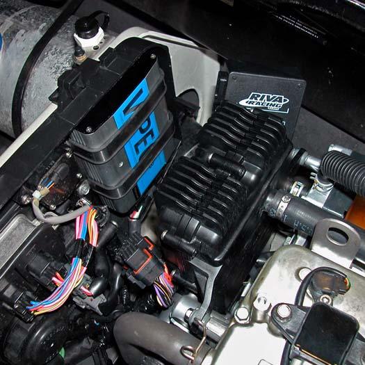 Use supplied straps and stock bolts to secure ECU to 
