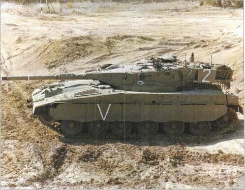 LIGHT TANKS AND MAIN BATTLE TANKS Right: Merkava Mk 2 (Israeli MoD) VARIANTS Merkava Mk 2 entered production in 1983 and has several improvements, including improved armour protection and
