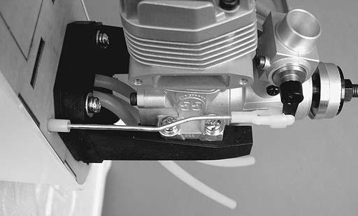 Make any necessary bends in the pushrod so the pushrod can actuate the throttle without binding.