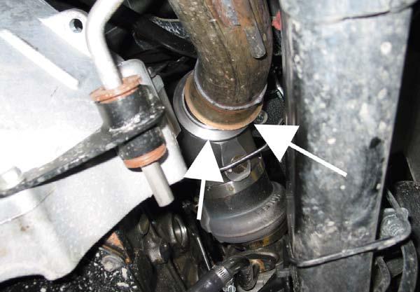 11 Brake Valve Installation From underneath the vehicle, remove the down pipe-to-turbo elbow band clamp