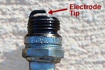 Do not remove the connector by gasping the wire. Never remove the spark plug connector by pulling the wire. 2. Using a spark plug wrench, remove the spark plug and inspect the electrode tip.