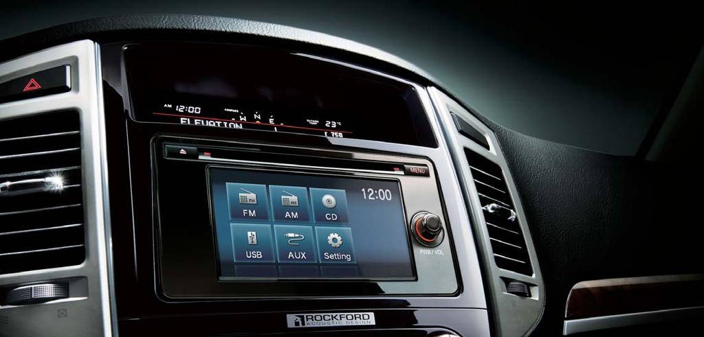 adjust the sound system with both hands on the wheel.