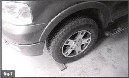 PREPARING THE VEHICLE FOR INSTALLATION: On a flat, level surface (concrete or paved area recommended) Block the front tires