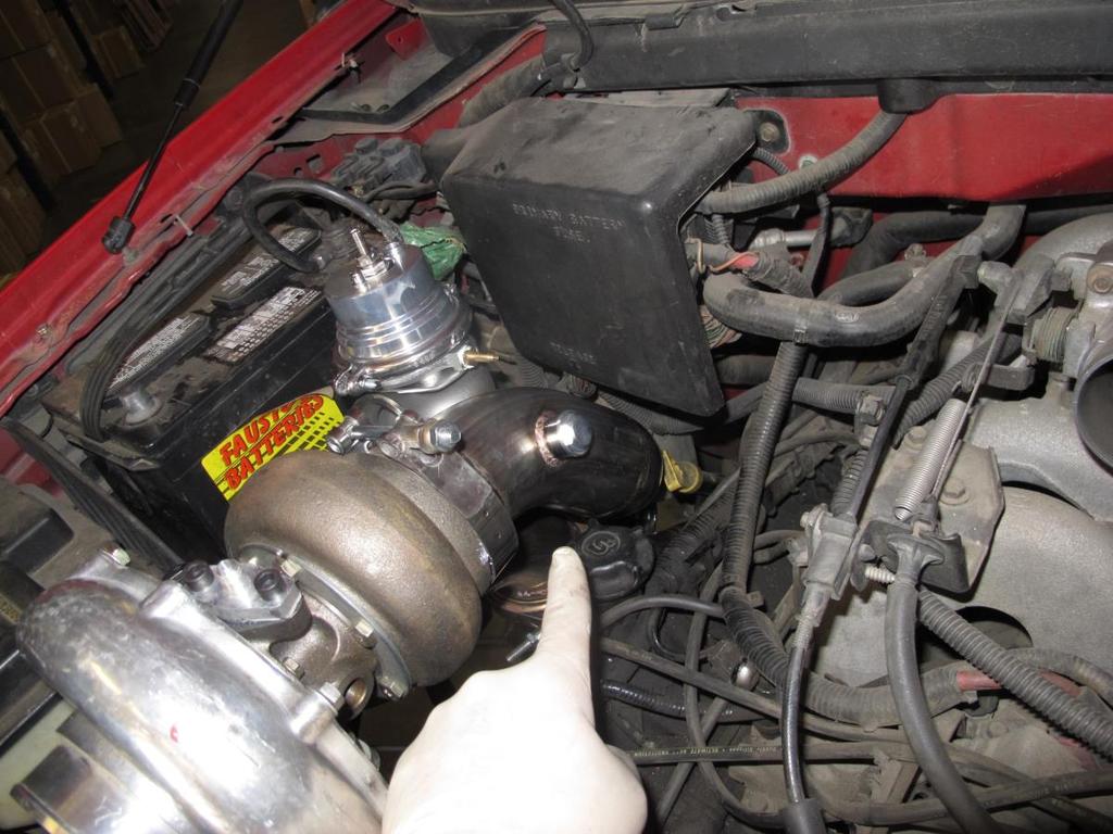 Proceed with connecting the turbo downpipe to the turbo as shown above using