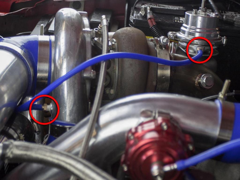 For the last step hook up the wastegate vacuum line to the fitting on the compressor side of the turbo as shown above.