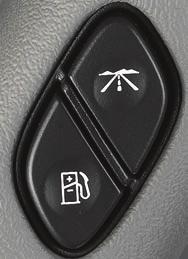 14 Getting to Know Your Tahoe/Suburban Easy Exit Driver Seat 1. Adjust the seat to the desired position. 2. Press and hold the exit button ( ) on the driver s door until two chimes sound.