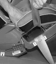 4. Push restraint down firmly into vehicle seat while pulling shoulder portion of seat belt to remove slack and tighten lap portion of seat belt. (Fig.