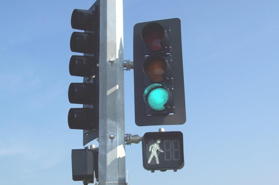 A background shield (or backplate) must be dull nonreflective black and attached to a vehicle signal head